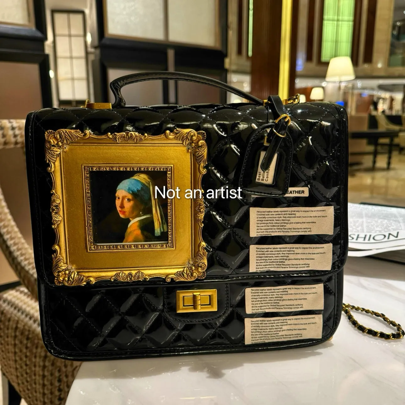 NOT AN ARTIST Walking artist patent leather structured handbag  - CUE