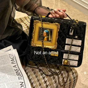 NOT AN ARTIST Walking artist patent leather structured handbag  - CUE