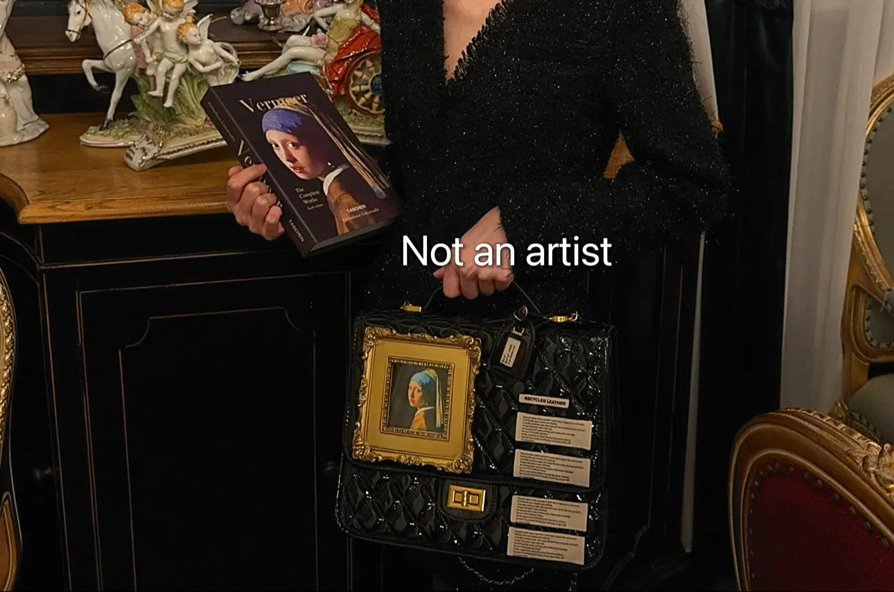 NOT AN ARTIST Walking artist patent leather structured handbag  - CUE